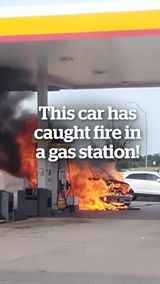 This car has caught fire in a gas station!
